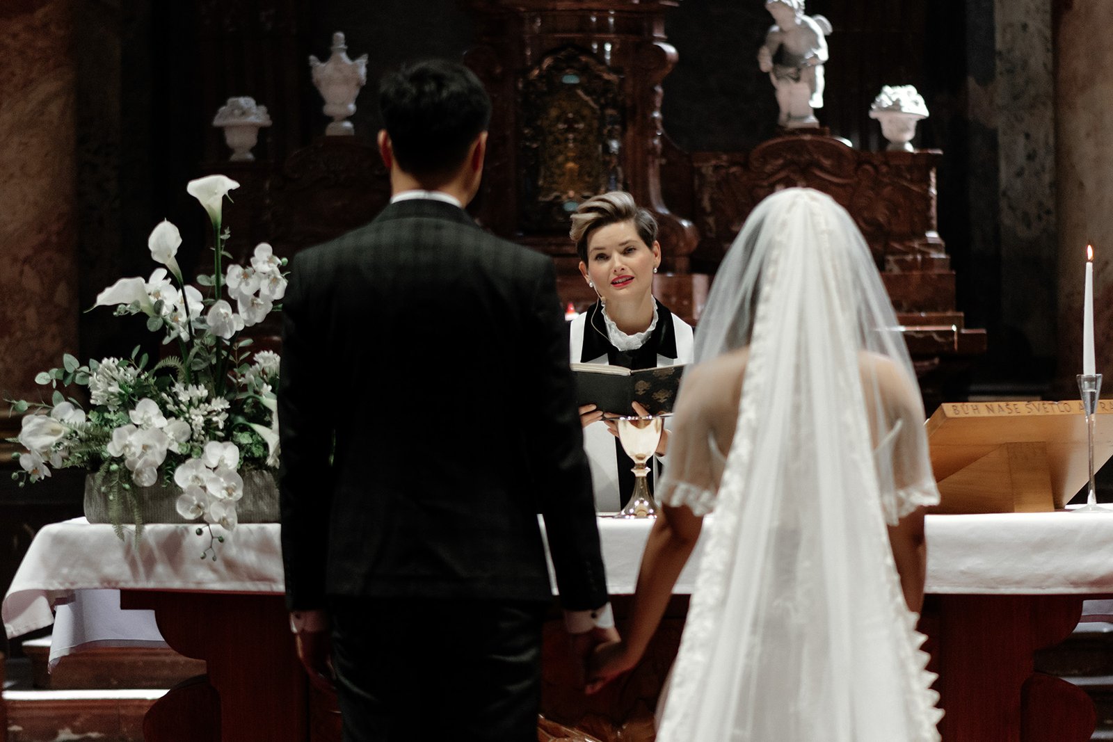 Wedding ceremony at St. Nicholas Cathedral in Prague